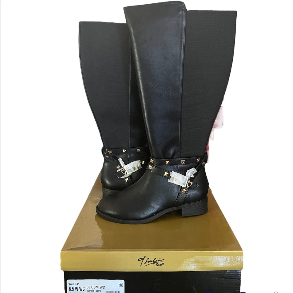 Tall black boots